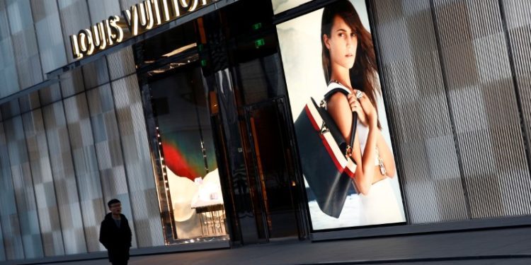 What are the key investor debates surrounding the luxury sector?