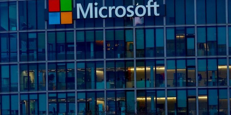 Microsoft names former GE CFO as operations chief