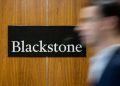Blackstone considers selling visa firm VFS Global, Bloomberg News reports