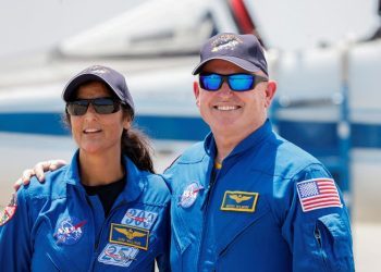 SpaceX capsule for stuck astronauts docks at space station