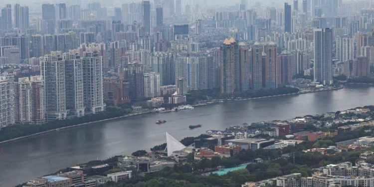 China property shares surge on easier home purchase rules, improved sentiment