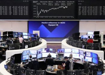 European shares end lower as automakers weigh, though clocks quarterly gains