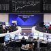 European shares end lower as automakers weigh, though clocks quarterly gains