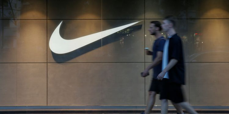Nike, AAR Corp set to report earnings Monday