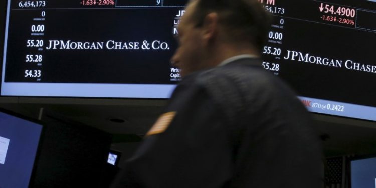 Tesla, JP Morgan lead Friday’s afternoon market cap stock movers