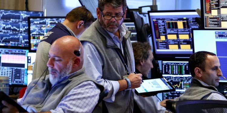 Wall Street mixed as megacap tech stocks fall; banks gain