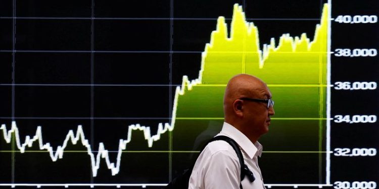 Asia stocks cautious after mixed China data; dollar firm on Fed view