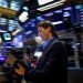 Wall St muted as investors pause ahead of big corporate earnings