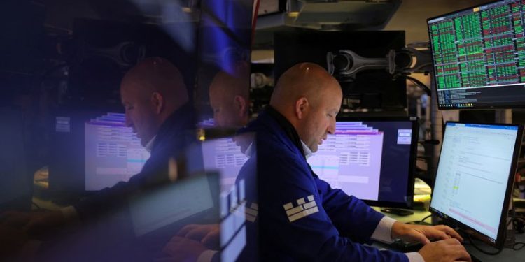 Wall St closes little changed while investors digest yields, earnings