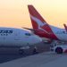 Australia’s Qantas hits record high as Jefferies lifts price target