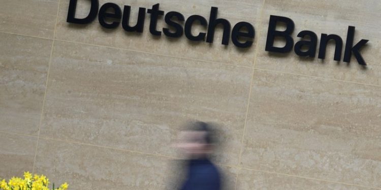 Deutsche Bank returns to quarterly profit as lawsuit provisions cut