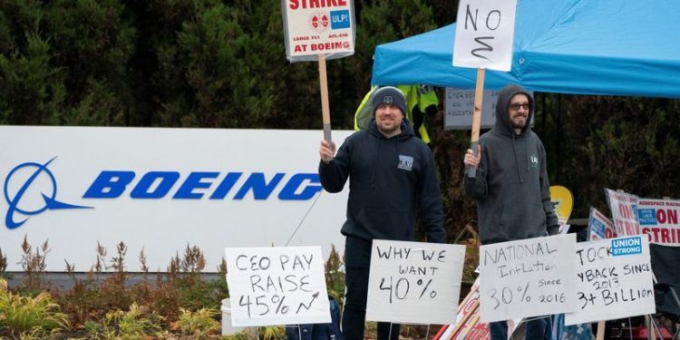 Boeing factory workers reject wage deal, extending strike