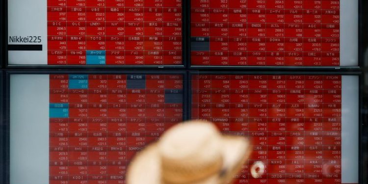 Asia shares fall on US election anxiety; Tesla earnings provide some cheer