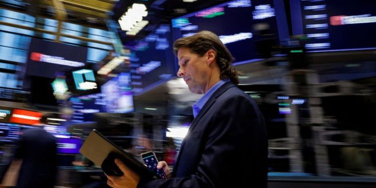 Tesla surge drives S&P 500, Nasdaq higher; IBM weighs on Dow