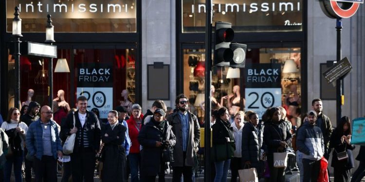 Analysis-Bricks over clicks as shops come back into fashion in Europe