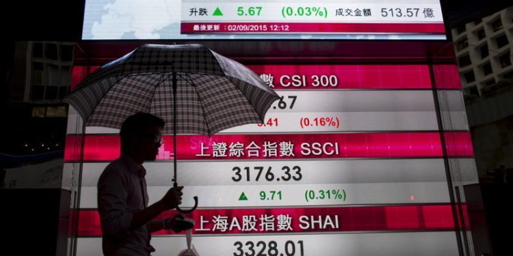 Asia stocks fall as rising yields dent tech, weak data weighs