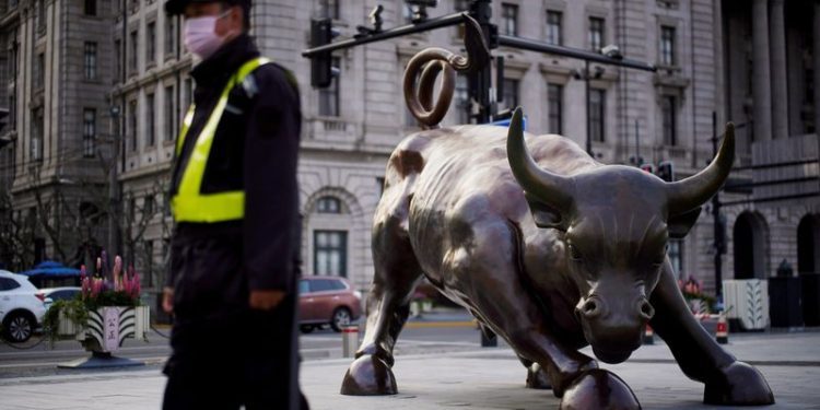 Asian stocks fall amid rate, tech jitters; China shares return with a bang