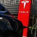 Tesla, Adobe among Friday’s market cap stock movers