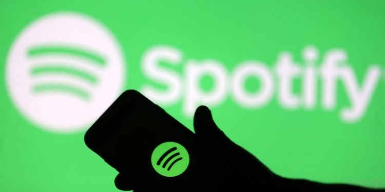 Spotify forecasts profit above estimates on cost cuts, steady user growth