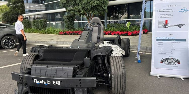 Exclusive-Chinese giant CATL pushes beyond batteries into power grids, EV platforms