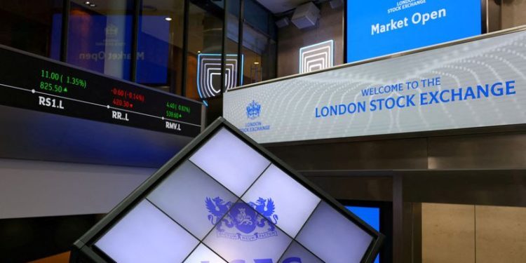 UK stocks edge higher, Burberry boosts mid-caps