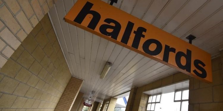 Halfords beats estimates, shares jump 13%