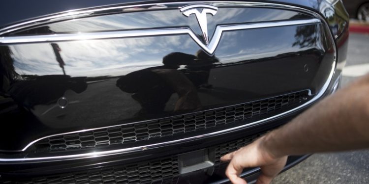 Tesla, Shopify Lead Moring Market Cap Stock Movers on Tuesday