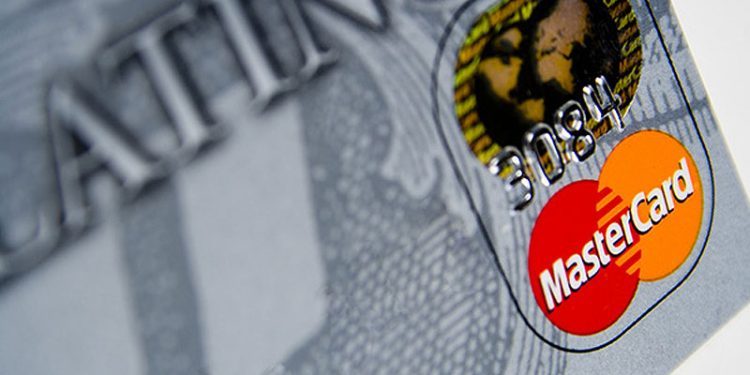 Mastercard offers mid-term guidance, shares rise