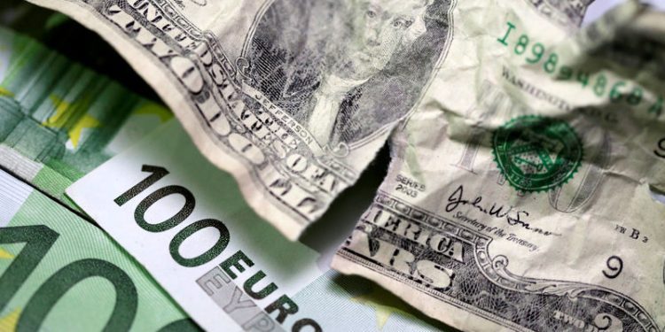 Dollar bounces after sharp loss; euro retreats on Lagarde comment