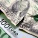 Dollar bounces after sharp loss; euro retreats on Lagarde comment