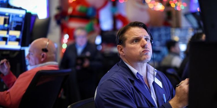 Stocks dive after Fed cuts rates, signals slower easing pace in 2025