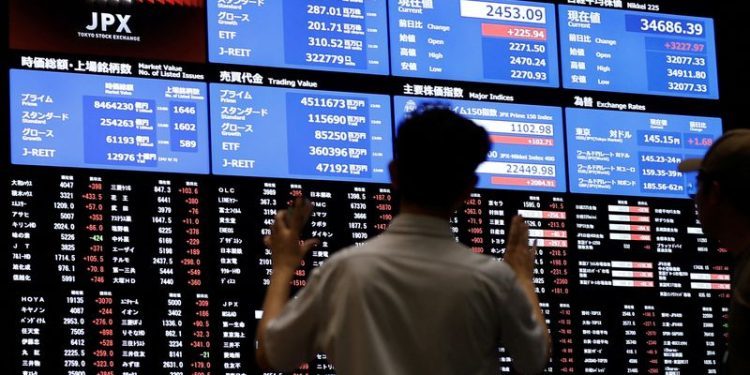 Asian stocks fall after Fed flags slower rate cuts, BOJ stands pat