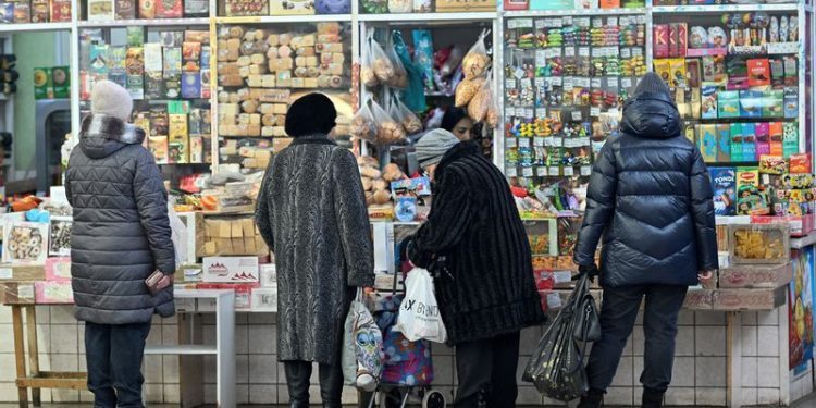 Exclusive-Top Russian banker says sanctions-hit economy will slow in 2025