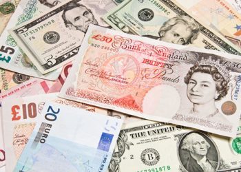 Dollar retains strength ahead of Fed meeting; sterling sees support