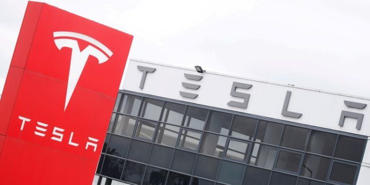 Tesla, Avago lead market cap stock movers on Monday