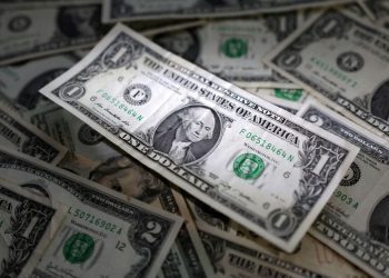 Dollar dominates on cautious Fed, Trump trade