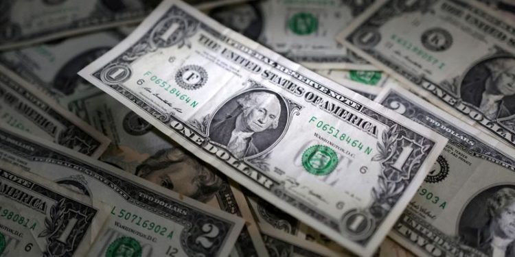 Dollar dominates on cautious Fed, Trump trade