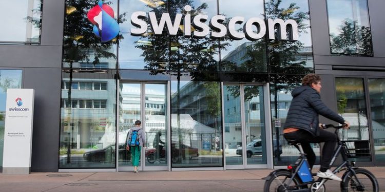 Swisscom revises down earnings outlook after Vodafone Italia acquisition complete