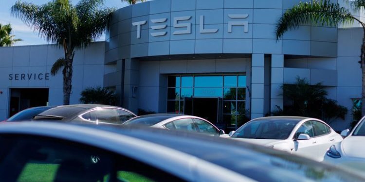 Tesla annual deliveries fall for first time as competition hurts demand