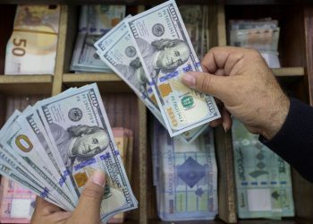 Dollar follows yields higher on solid US data