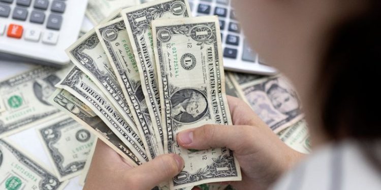 US dollar stranglehold on global FX sets stage for euro parity – Reuters Poll