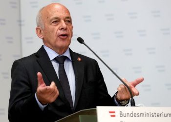 Former Swiss finance minister warns about size of enlarged UBS, newspaper says