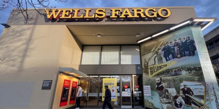 Wells Fargo raises interest income forecast as strong dealmaking drives profit beat