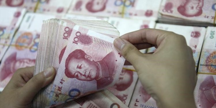 China boosts support for yuan, increases overseas borrowing limits