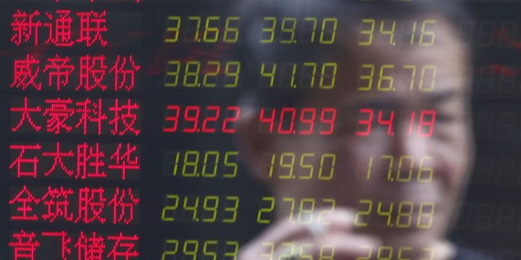 Asia stocks mixed; Chinese shares surge on report of gradual Trump tariffs