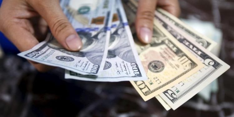 Dollar retains strength ahead of CPI release; sterling weakens again
