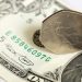 Dollar retains strength ahead of payrolls; sterling slips again
