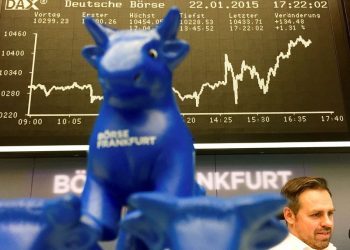 European stocks mixed; retailers slump after updates